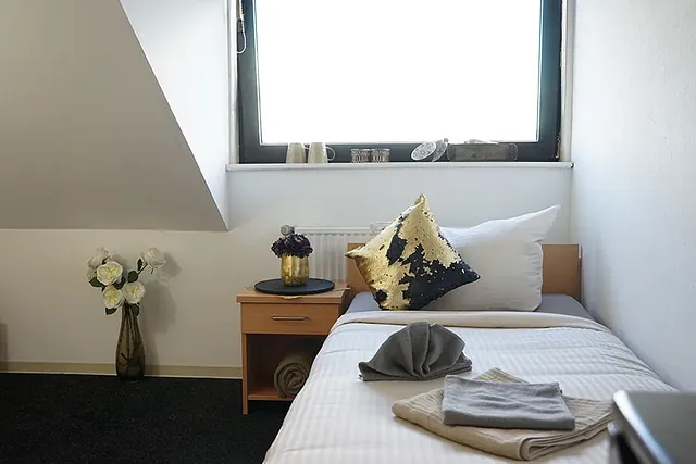 Einzelbett im Exclusive Hotelzimmer
